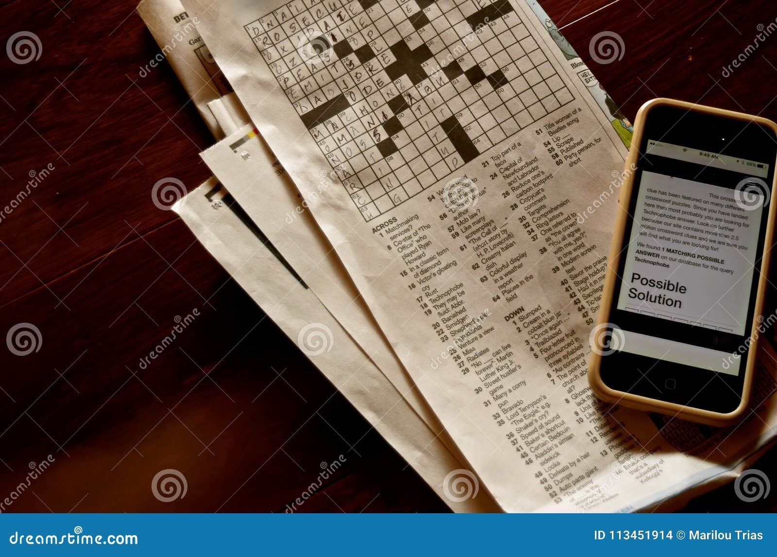 prefix with phone crossword clue